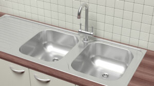 Why Standing Water in a Double-Bowl Sink Points to a Specific Type of Line Restriction