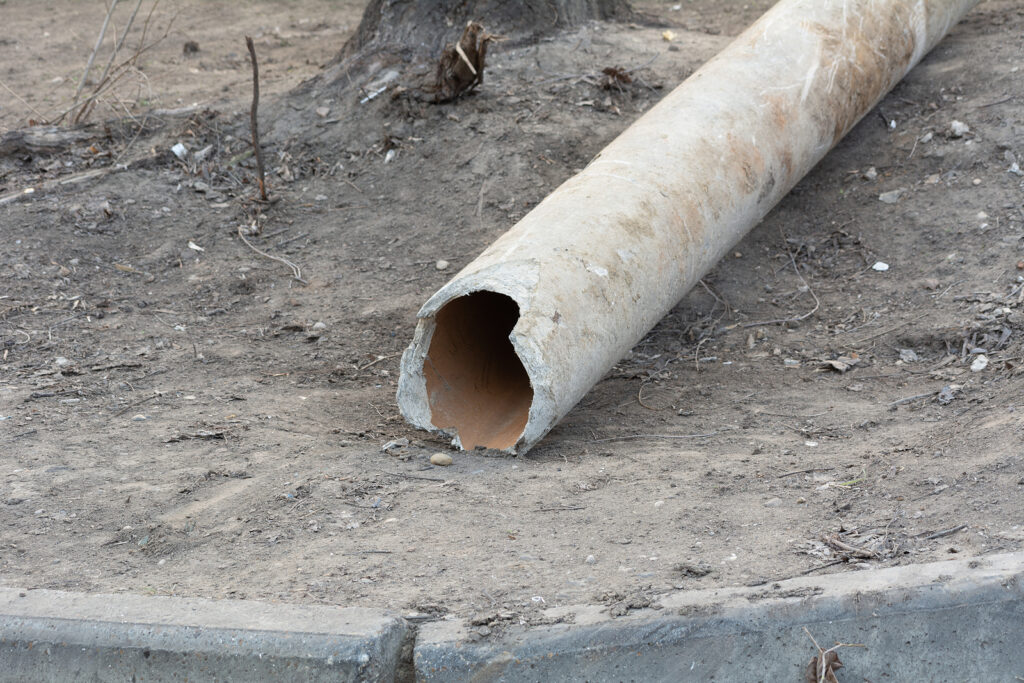 Cast Iron Pipe Bellies That Trap Waste and How Restoration Stabilizes Them